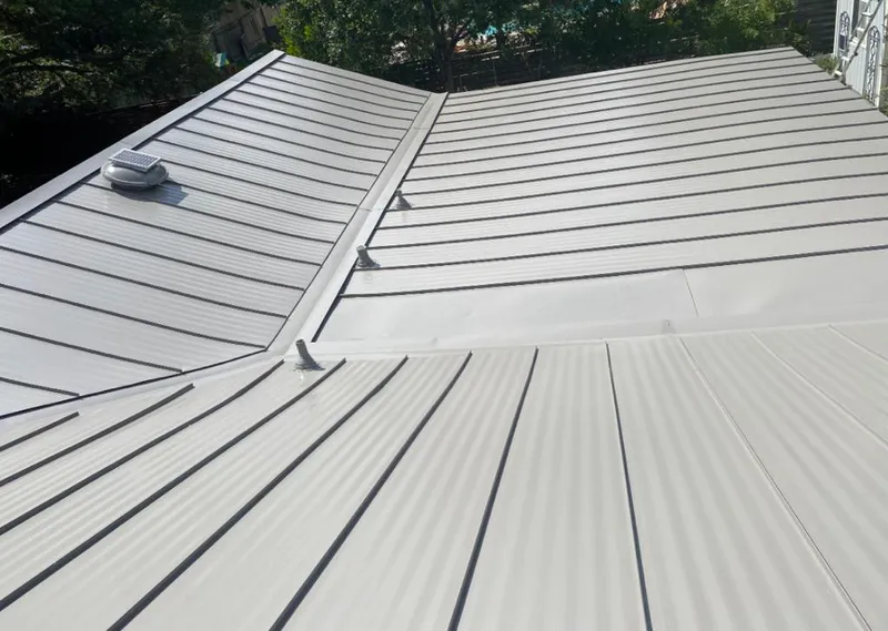 Solar attic fan installed on a metal roof for Roof Ventilation in Clearlake